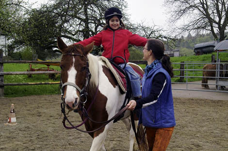 Foto: Reittherapie mit Kind